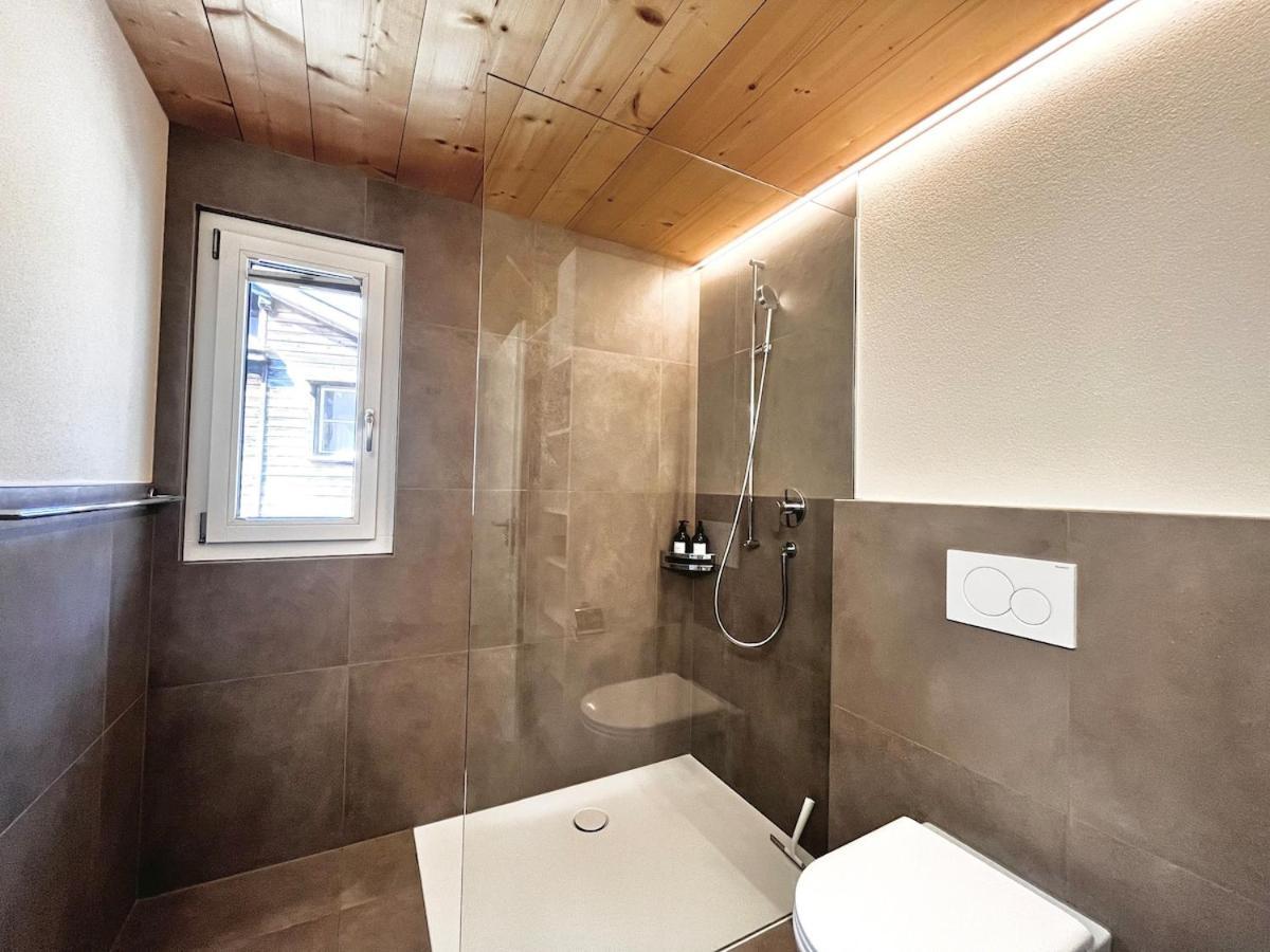 Appartamento Beim Brunnen Gsteigwiler Esterno foto